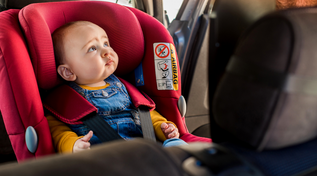 What are the extended rear-facing car seats available for my 13-month-old twins?